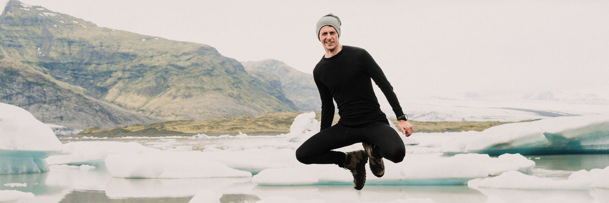 a-man-with-black-thermal-shirt-and-pants-jumped-in-the-air-at-winter