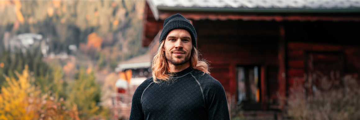 two-men-shakes-hands-on-the-bridge-above-frozen-lake-in-winter