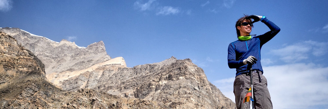 a-man-in-the-mountains-looks-around