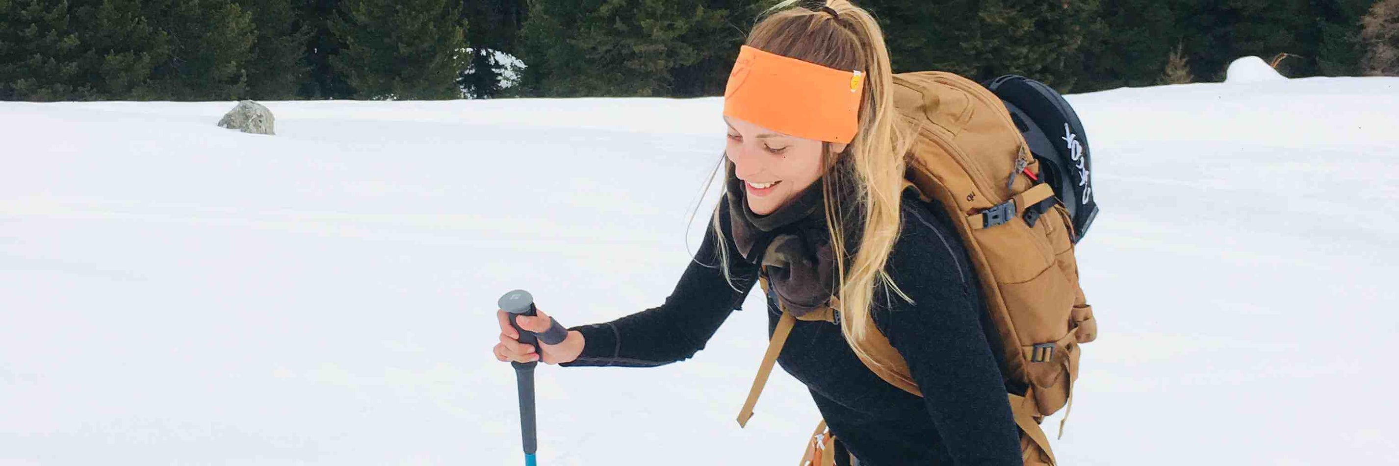 happy-woman-on-her-skis-in-winter