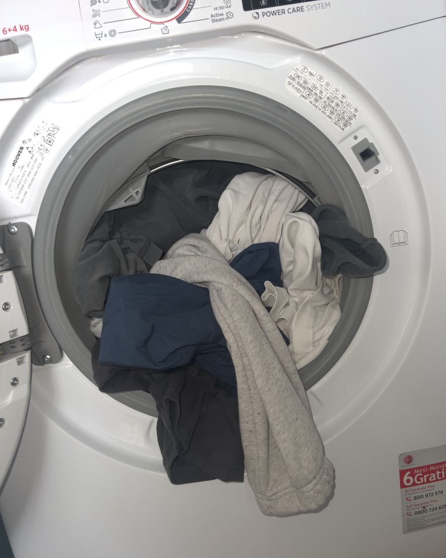 Washing machine full of everyday laundry
